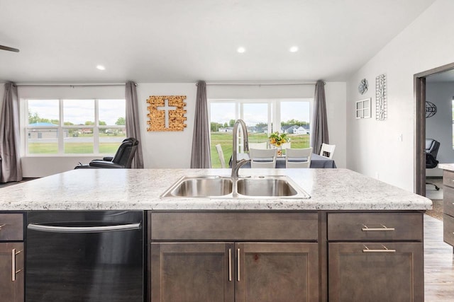 1732 Patriot Way, Neenah, WI 54956 - kitchen featuring dishwasher, a sink, dark brown cabinetry, wood finished floors, and recessed lighting