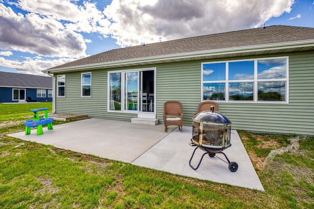 1732 Patriot Way, Neenah, WI 54956 - back of property with an outdoor fire pit, a yard, and a patio area