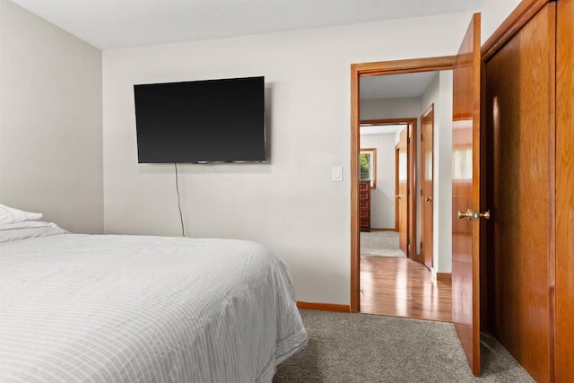 1651 4th St, Port Edwards, WI 54469 - bedroom with carpet flooring and baseboards