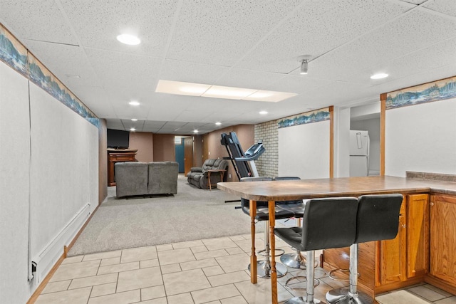 1651 4th St, Port Edwards, WI 54469 - dining space featuring light colored carpet and a paneled ceiling