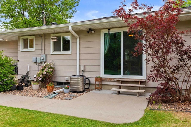 1651 4th St, Port Edwards, WI 54469 - back of property featuring a patio area and central AC