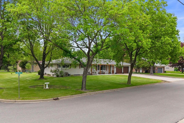 1651 4th St, Port Edwards, WI 54469 - ranch-style house featuring an attached garage, concrete driveway, and a front yard