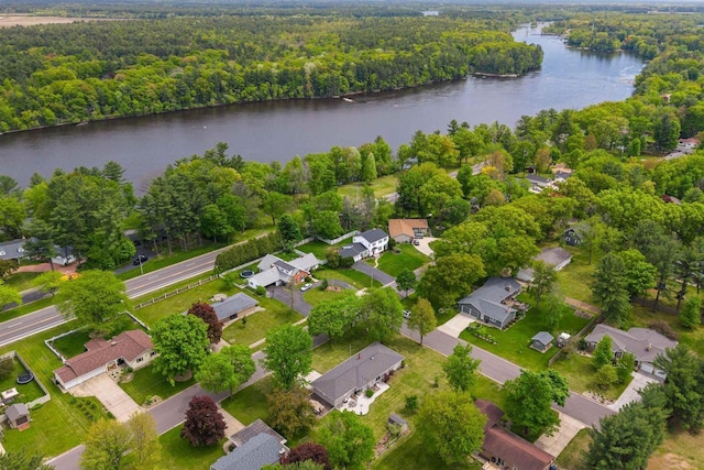1651 4th St, Port Edwards, WI 54469 - aerial overview of property's location featuring a large body of water, a heavily wooded area, and nearby suburban area
