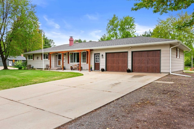 1651 4th St, Port Edwards, WI 54469 - single story home featuring a garage, a chimney, a front yard, a porch, and driveway