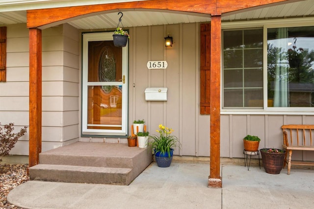 1651 4th St, Port Edwards, WI 54469 - property entrance with board and batten siding