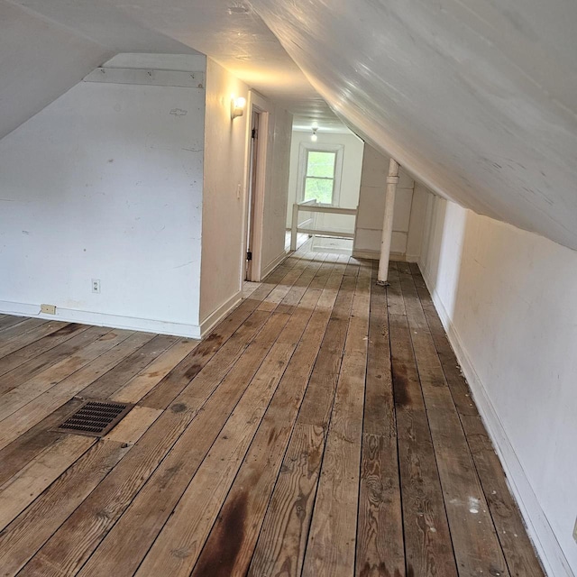 1048 W Wisconsin St, Portage, WI 53901 - bonus room with hardwood / wood-style floors and vaulted ceiling
