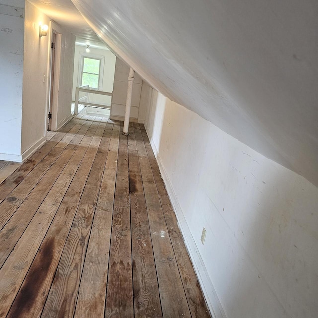 1048 W Wisconsin St, Portage, WI 53901 - bonus room featuring lofted ceiling and hardwood / wood-style floors
