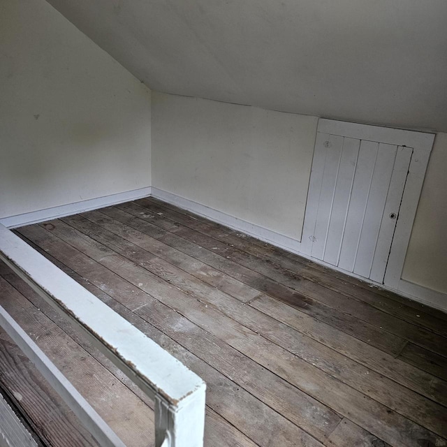 1048 W Wisconsin St, Portage, WI 53901 - bonus room featuring hardwood / wood-style floors and vaulted ceiling