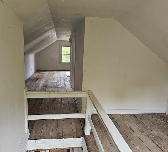 1048 W Wisconsin St, Portage, WI 53901 - bonus room with hardwood / wood-style flooring and lofted ceiling