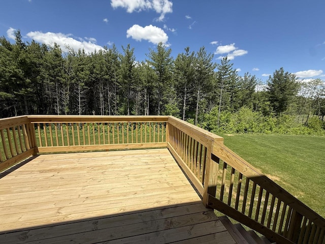 941 Colt Dr, Belleville, WI 53508 - deck with a lawn and a wooded view