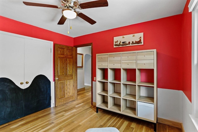 4705 Winnequah Rd, Monona, WI 53716 - unfurnished bedroom featuring wood finished floors, baseboards, a ceiling fan, and a closet