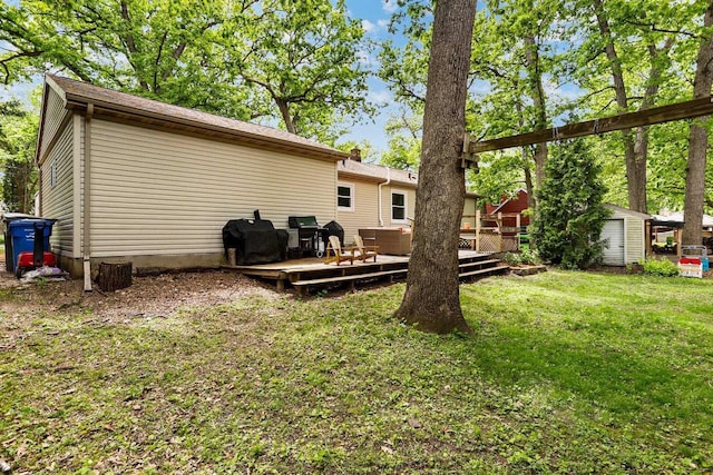 4705 Winnequah Rd, Monona, WI 53716 - back of house featuring a deck and a yard