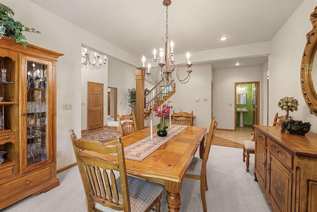 705 Red Fox, Fond Du Lac, WI 54937 - dining area featuring a chandelier, stairs, light carpet, recessed lighting, and baseboards