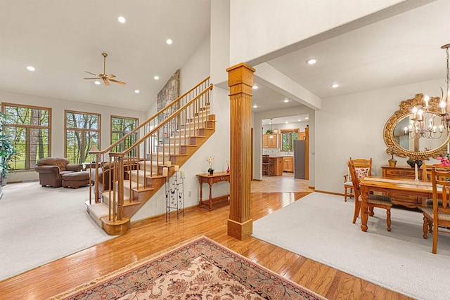 705 Red Fox, Fond Du Lac, WI 54937 - stairway with ceiling fan, wood finished floors, recessed lighting, baseboards, and high vaulted ceiling