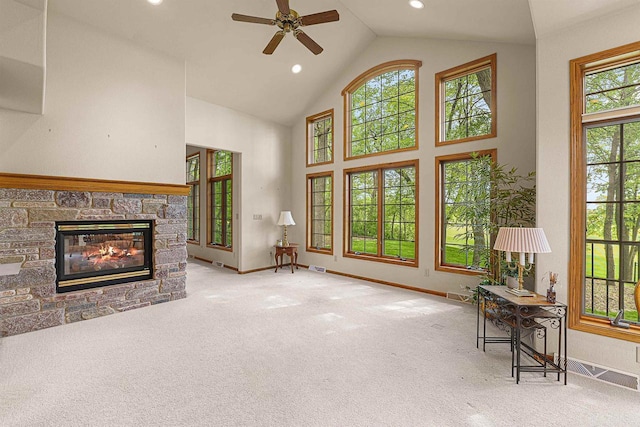 705 Red Fox, Fond Du Lac, WI 54937 - carpeted living area featuring baseboards, ceiling fan, a fireplace, high vaulted ceiling, and recessed lighting