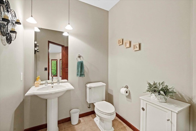 7197 Welford Pl, Sun Prairie, WI 53590 - bathroom with toilet, baseboards, and tile patterned floors