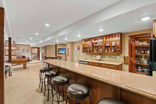 7197 Welford Pl, Sun Prairie, WI 53590 - indoor wet bar featuring recessed lighting, billiards, carpet, and freestanding refrigerator