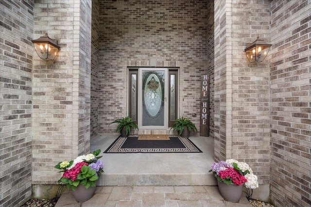 7197 Welford Pl, Sun Prairie, WI 53590 - property entrance with brick siding