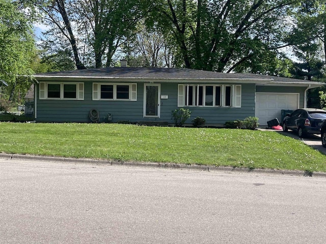109 Cherry St, Edgerton, WI 53534 - single story home with a garage and a front yard