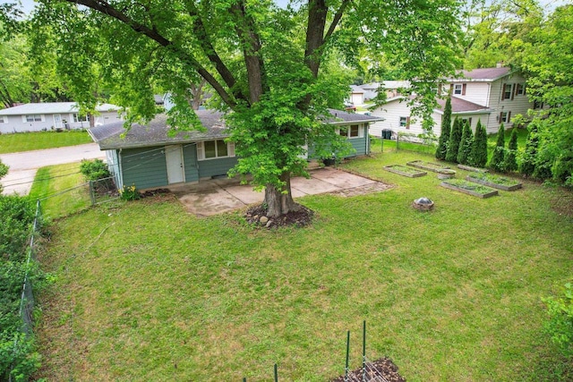 109 Cherry St, Edgerton, WI 53534 - view of yard with a vegetable garden and a patio area