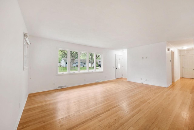 109 Cherry St, Edgerton, WI 53534 - empty room with light wood-style flooring and baseboards