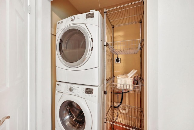 109 Cherry St, Edgerton, WI 53534 - laundry room featuring stacked washer / dryer
