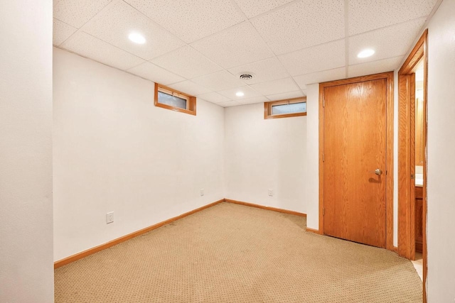 109 Cherry St, Edgerton, WI 53534 - spare room featuring light colored carpet, recessed lighting, a drop ceiling, and baseboards