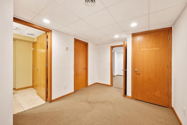 109 Cherry St, Edgerton, WI 53534 - unfurnished bedroom with light carpet, recessed lighting, a closet, baseboards, and a drop ceiling