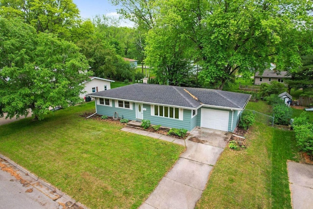 109 Cherry St, Edgerton, WI 53534 - ranch-style house with a garage, driveway, and roof with shingles