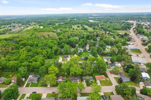 109 Cherry St, Edgerton, WI 53534 - aerial perspective of suburban area featuring a forest