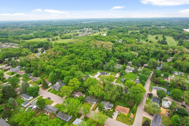 109 Cherry St, Edgerton, WI 53534 - aerial perspective of suburban area with a heavily wooded area