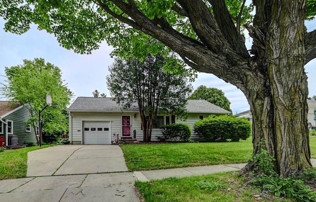 613 Anthony Ln, Madison, WI 53711 - view of front facade with an attached garage, driveway, and a front yard