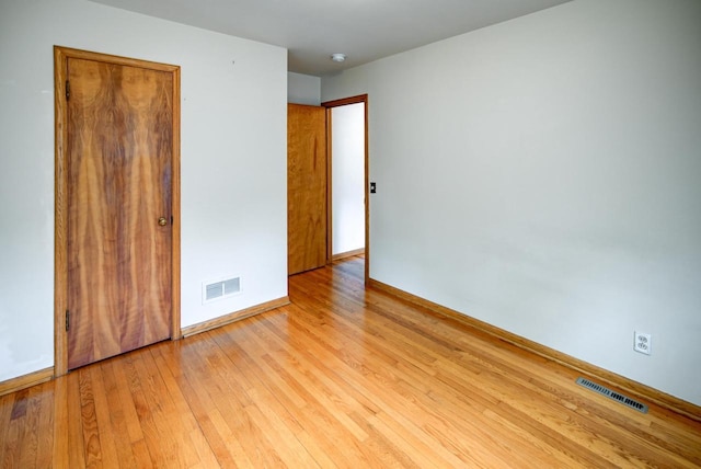 613 Anthony Ln, Madison, WI 53711 - unfurnished bedroom with light wood-type flooring and baseboards