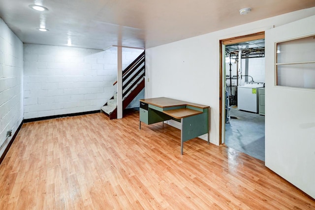 613 Anthony Ln, Madison, WI 53711 - spare room featuring stairway, light wood-style floors, concrete block wall, and a smoke detector