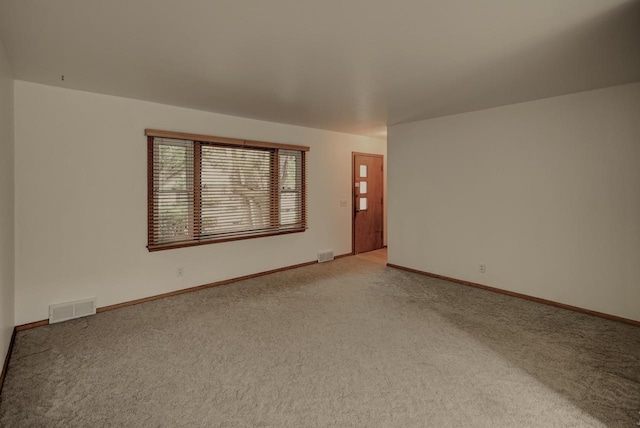 613 Anthony Ln, Madison, WI 53711 - empty room featuring light colored carpet and baseboards