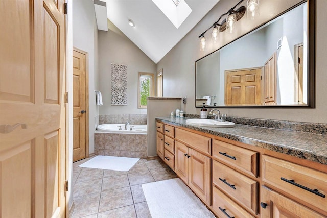 8373 Serenity Ln, Pulaski, WI 54162 - bathroom with a skylight, a bath, vaulted ceiling, tile patterned flooring, and vanity