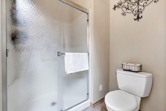 8373 Serenity Ln, Pulaski, WI 54162 - bathroom with toilet, a stall shower, and baseboards