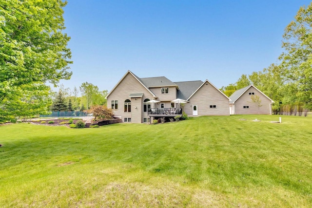8373 Serenity Ln, Pulaski, WI 54162 - back of property featuring a deck and a lawn