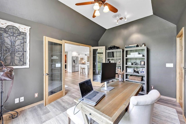 8373 Serenity Ln, Pulaski, WI 54162 - office with vaulted ceiling, french doors, wood finished floors, a ceiling fan, and baseboards