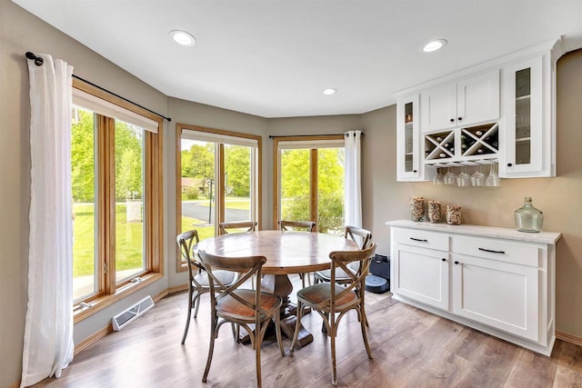 8373 Serenity Ln, Pulaski, WI 54162 - dining space featuring healthy amount of natural light, baseboards, and recessed lighting