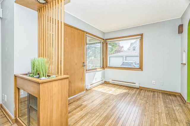 3559 E Van Norman Ave, Cudahy, WI 53110 - entrance foyer featuring a baseboard radiator, hardwood / wood-style flooring, and baseboards