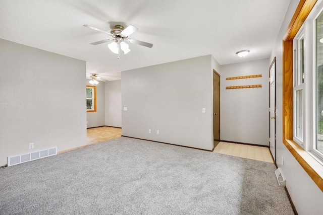 530 Dapin Rd, Madison, WI 53704 - unfurnished room with a ceiling fan and light carpet