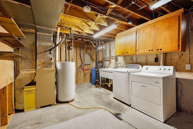530 Dapin Rd, Madison, WI 53704 - laundry room featuring separate washer and dryer, water heater, and cabinet space