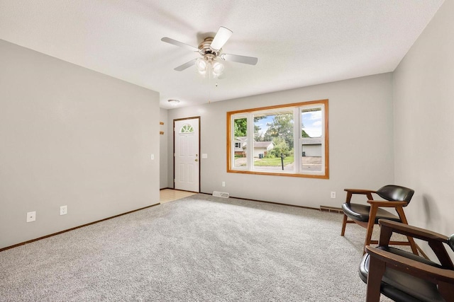 530 Dapin Rd, Madison, WI 53704 - living area with light carpet and ceiling fan