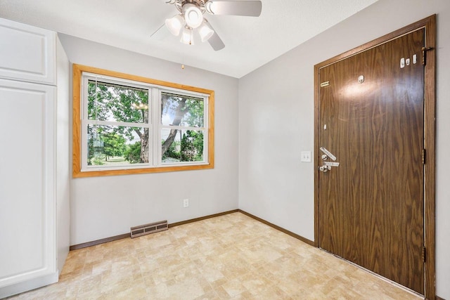 530 Dapin Rd, Madison, WI 53704 - empty room featuring a ceiling fan, lofted ceiling, and light floors