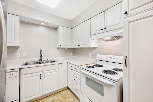530 Dapin Rd, Madison, WI 53704 - kitchen with white appliances, under cabinet range hood, white cabinetry, light countertops, and recessed lighting