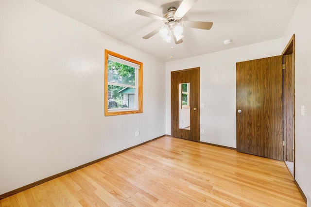 530 Dapin Rd, Madison, WI 53704 - unfurnished bedroom featuring light wood-type flooring and ceiling fan