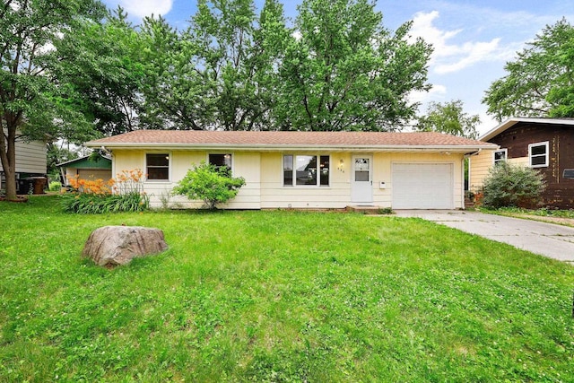 530 Dapin Rd, Madison, WI 53704 - ranch-style house with driveway, a garage, and a front yard