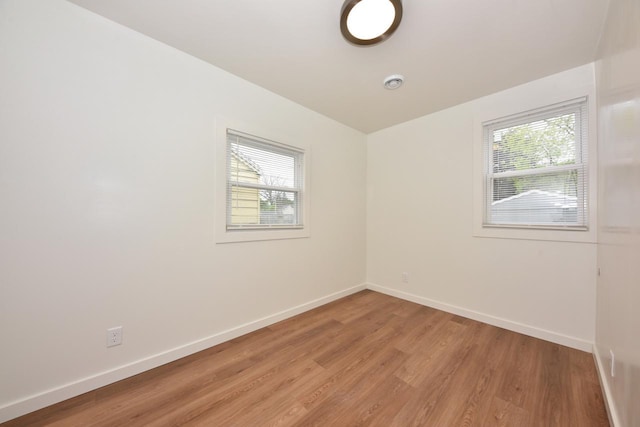 4212 N 53rd St, Milwaukee, WI 53216 - spare room featuring plenty of natural light, baseboards, and light wood-style floors