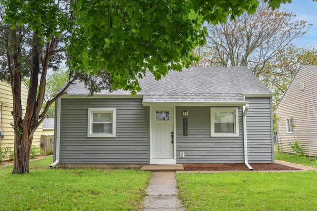 4212 N 53rd St, Milwaukee, WI 53216 - bungalow with roof with shingles and a front yard